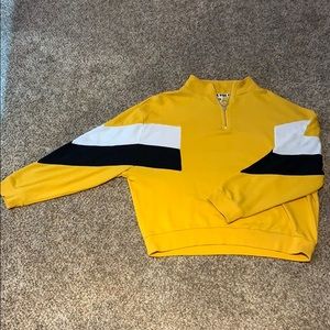 a gold colored PINK quarter-zip